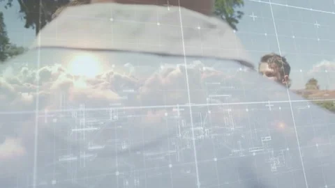 Two men talking in park, camera shifting as grid overlay rising, speaker Stock Footage 333720321