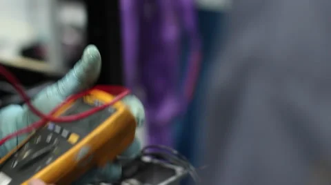 Two Men Use Voltmeter Stock Footage 61544803