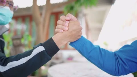 Two men used their hands to shake and shake. Stock-Footage 147956851