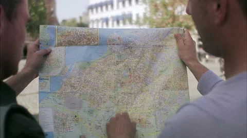 Two men using a map Stock Footage 11287191