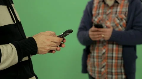 Two men using smartphone - rack focus Video stock 46154066