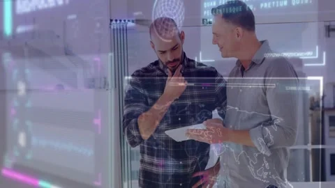 Two men using tablet by glass tech pointing initiating hologram map aligning Stock Footage 334178605