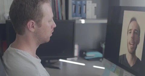 Two men on a video conference call in home office Stock Footage 78037500
