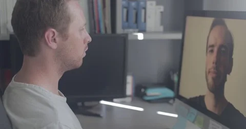 Two men on a video conference call in home office Stock Footage 78037515