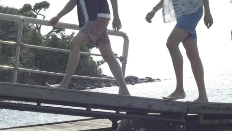 Two men walking to the bridge Stock Footage 129493314