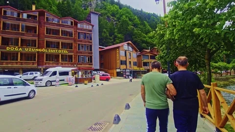 Two men walking down the. Stock Footage 284635325