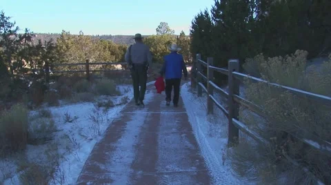 Two men walking on trail Stock Footage 60737126