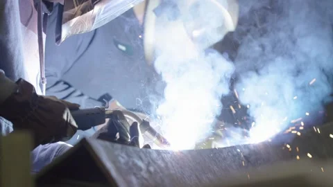 Two men welding Stock Footage 238860302