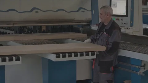 Two men work in the factory Stock Footage 85237648