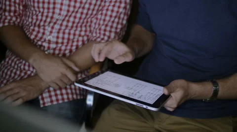 Two men work at night in the office Stock Footage 58014768