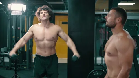 Two men work out in gym. Stock Footage 164613827