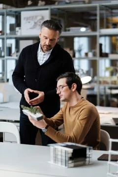 Two men working in design and engineering architecture office Stock Photos