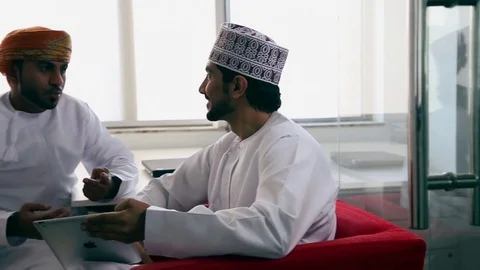 Two men working on a digital tablet in the office Stock Footage 70103312