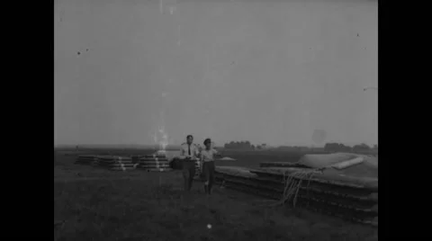 Two men working at Roosevelt Field Stock Footage 43322961