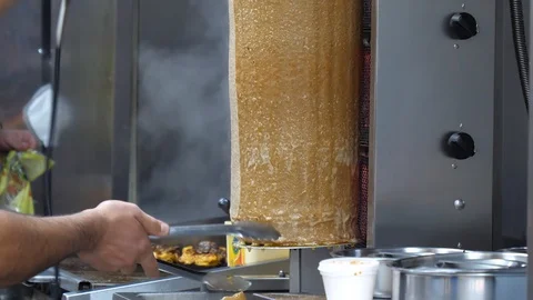 Two men working at takeaway or take-out restaurant Видео 97794776