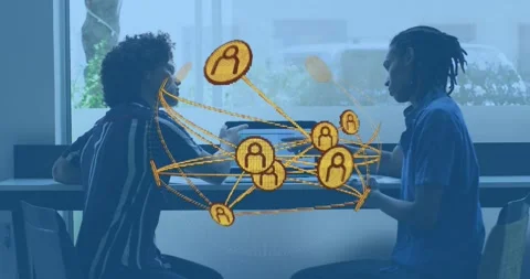 Two men working on tech project interacting with laptop while network graphic Stock Footage 317793790