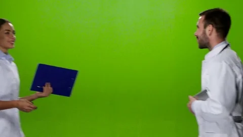 Two met the doctors and talk about the patients. Green screen Stock Footage 70224360