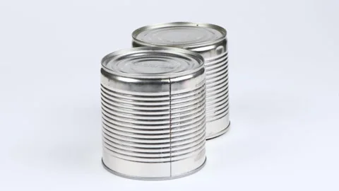 Two metal cans on a white background. Side view. Loop motion. Stock Footage 245074026
