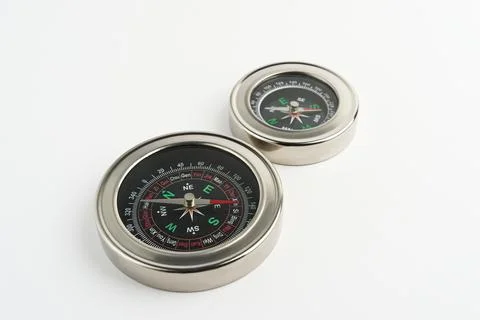 Two Metal Compasses on White Background – Navigation Tools Stock Photos