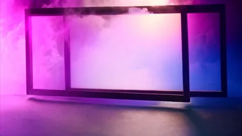 Two metal horizontal rectangular frames surrounded by colored smoke, dark b.. 動画素材 273954736