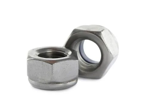 Two metal nyloc nuts on white background Foto stock