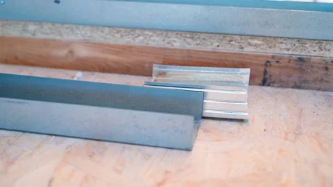 Two metal profiles of different types. The choice of a profile for the Stock Footage 235421637