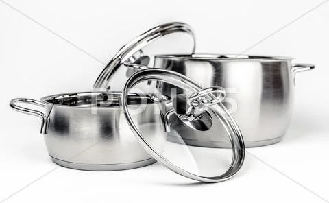 Two Metal stock pots with glass lid Stock Photos