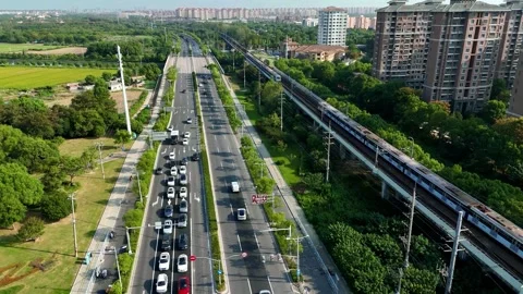 Two Metro Trains Passing on Elevated Railway Near Sheshan-Shanghai Stock Footage 342140988