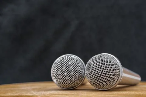 Two microphones are on the table. Stock Photos