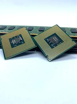 Two microprocessors on a stack of RAM memory closeup isolated on white backgr Foto stock