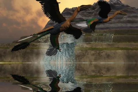 Two Microraptor dinosaurs fly near mountain waterfalls in prehistoric times. Stock Illustration