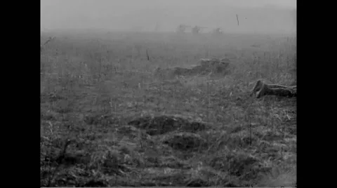 Two military soldiers lying on ground at Fort Bliss Stock Footage