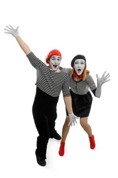Two mimes are having fun. Vertical full length portrait of man and woman Stock Photos