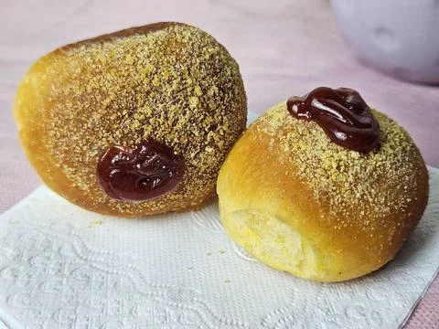 Two mini cornbreads, topped with guava paste. Stock Photos