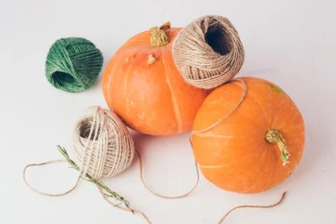 Two mini pumpkins on white background. Stock Photos