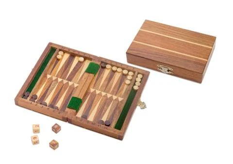 Two miniature travelling backgammon sets on a light background 写真素材