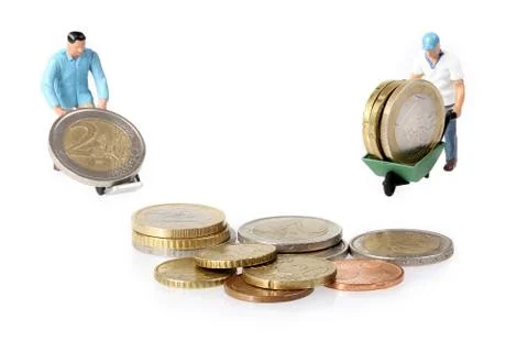 Two Miniature workers drives euro coins Stock Photos