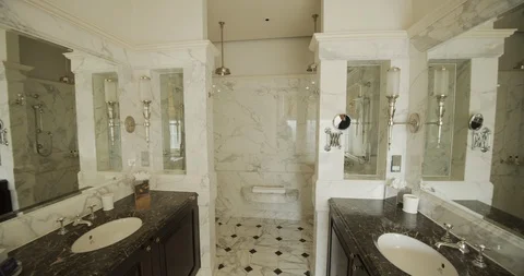 Two Mirroring Marble Sinks In A Luxurious Hotel Stock Footage 107558588