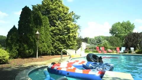 Two mixed boys have a fun in the swimming pool Video stock 136491067