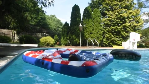 Two mixed boys have a fun in the swimming pool Video stock 136492331