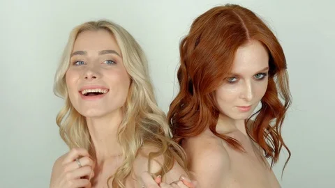 Two model friends posing indoor Stock Footage 88864781