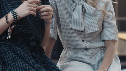 Two models of the girl sit on the gothic railing. Urban fashion. Stock Footage 104242254