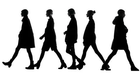 Two Models Walking Side-by-Side Silhouette Set Stock Illustration