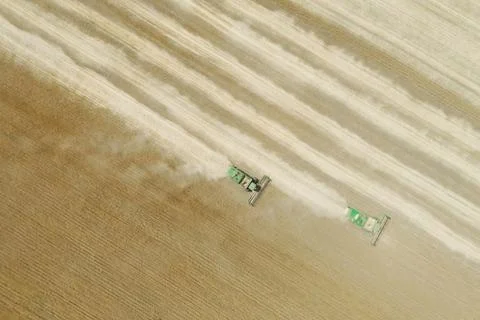 Two modern combine harvester working on the wheat crop Stock Photos