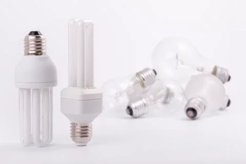 Two modern energy saving light bulbs Stock Photos