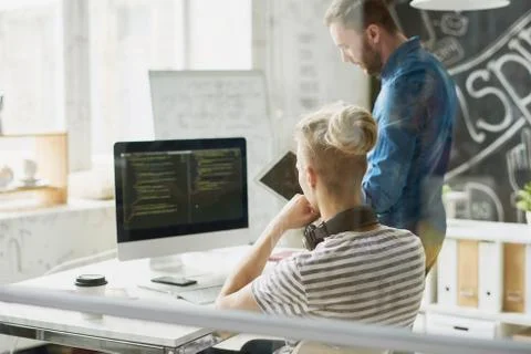 Two Modern Web Developers at Work Foto stock