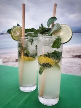Two mojitos on the beach Stock Photos