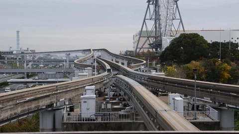 Two monorail trains passing by each other. Stock Footage 121861570