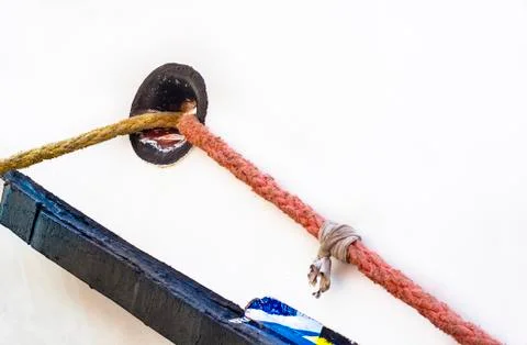 Two mooring ropes on side of ship Stock Photos