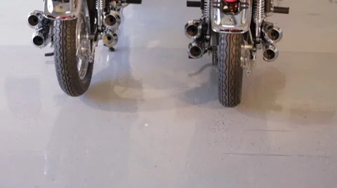 Two Mororcycles pan up from rear Stock Footage 34333075